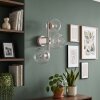 Applique murale moderne Koyoto à trois abat-jour ronds en verre clair