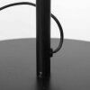 Steinhauer Lampadaire Bloeba à bras coudé orientable, abat-jour bleu, près du canapé