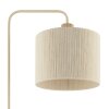 Brilliant Lampadaire Arlo à bras courbé beige, de style bohème, près du canapé